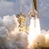 white shuttle spaceship takes on